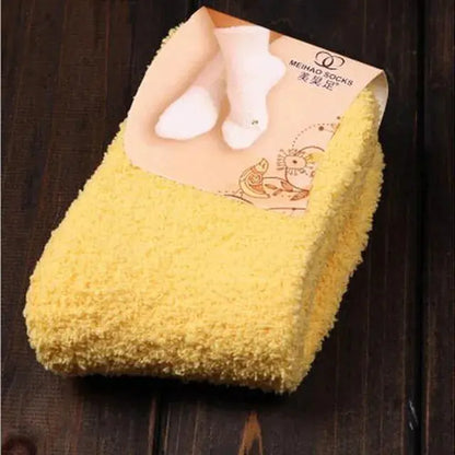 Luxurious Women's Bed Socks in a soothing yellow color, fluffy and warm, perfect for winter lounging or Christmas gifting.