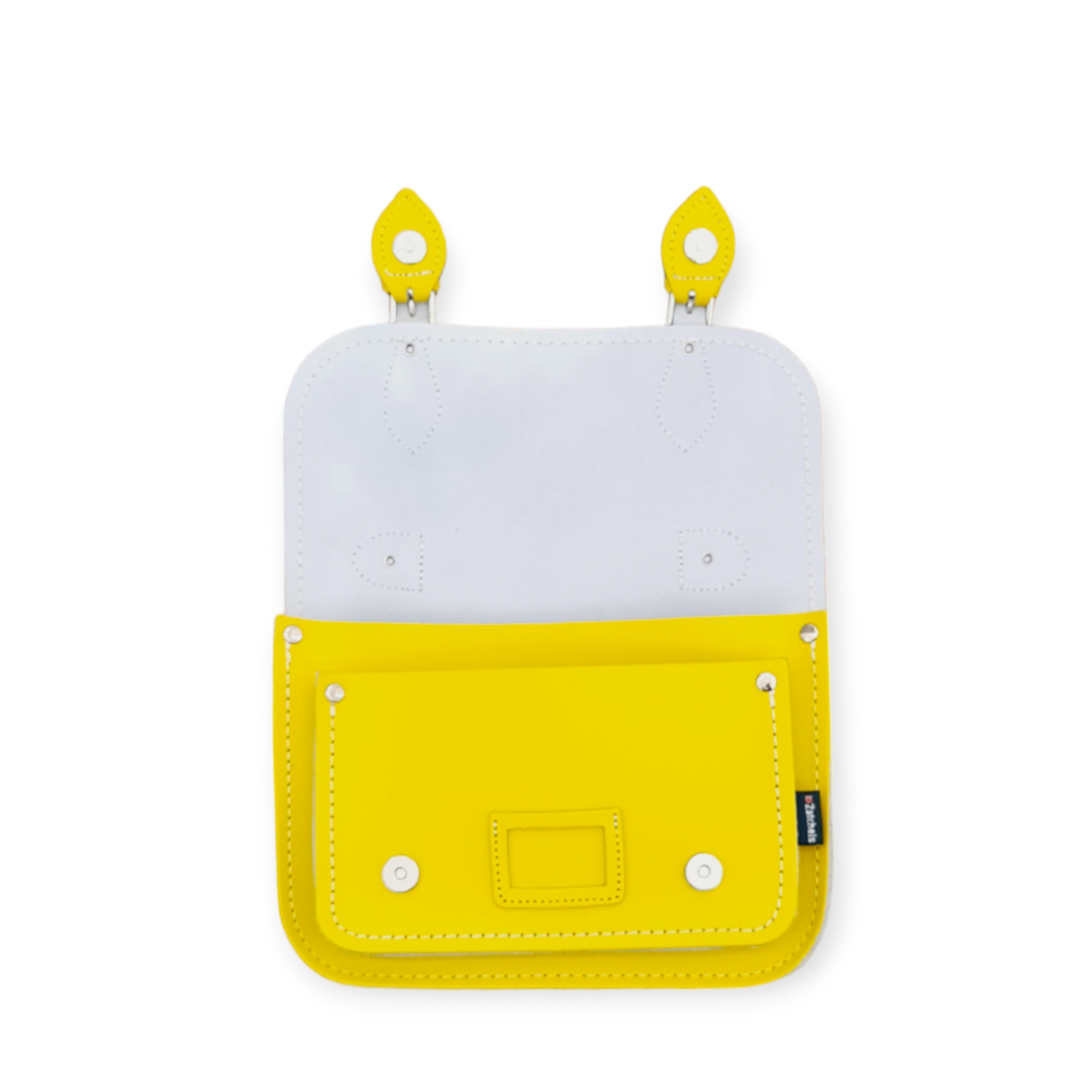 Spacious interior of the pastel daffodil yellow leather midi satchel with essentials like a smartphone and lipstick, exemplifying style and functionality.
