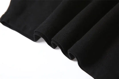 Versatile fashion choice for girls, the Drama Queen Star Graphic Baby Tee by Dazzling Dreams Studio, suitable for various occasions.