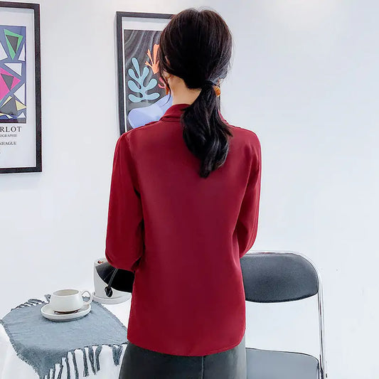 Elegant back view of the Premium Chiffon Satin V-Neck Blouse with Criss-Cross Neckline, showcasing luxurious fabric and sophisticated design for professional women.