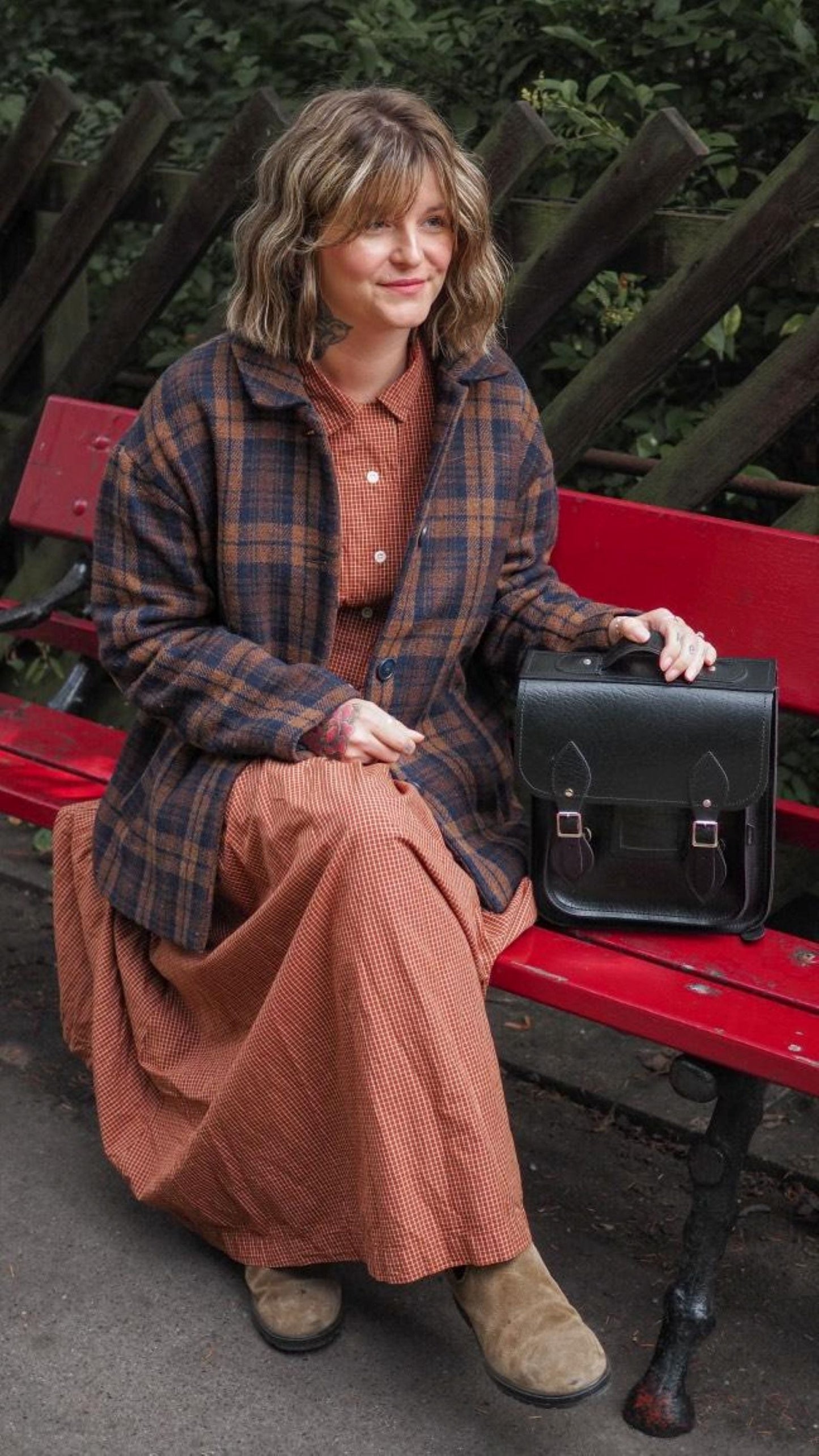 Elegant Black Leather City Backpack in Small and Plus sizes, perfect for urban adventures and stylishly accommodating tech essentials.