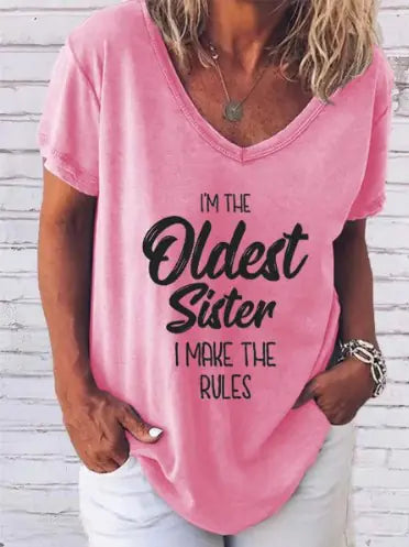 Sophisticated 'I'm The Oldest Sister' print tee from Dazzling Dreams Studio, ideal for asserting sisterly authority with flair.