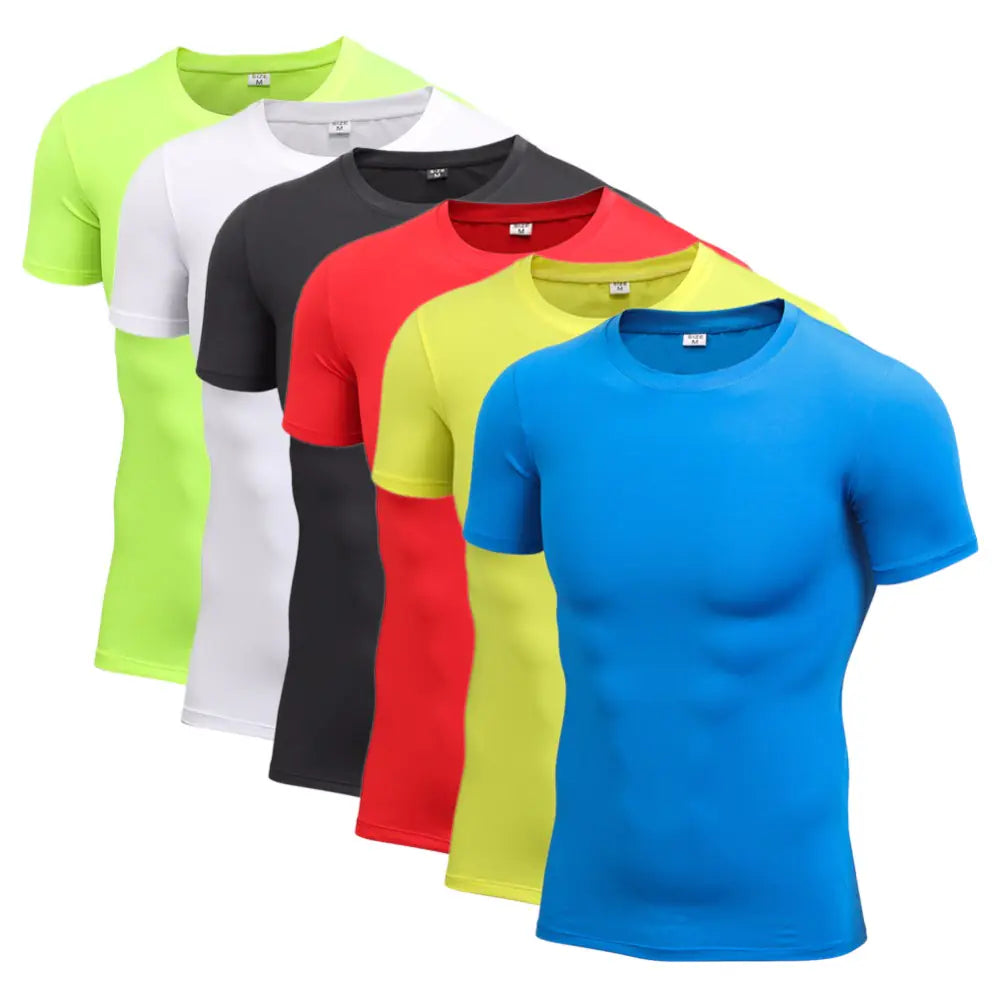 Assortment of luxury men's compression t-shirts in various colours including green, white, and blue, suitable for fashionable workouts.