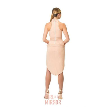 Model showcasing a halter neck stretch jersey dress with luxurious satin accents, emphasizing the stylish double split skirt, offered in chic black and sophisticated nude.